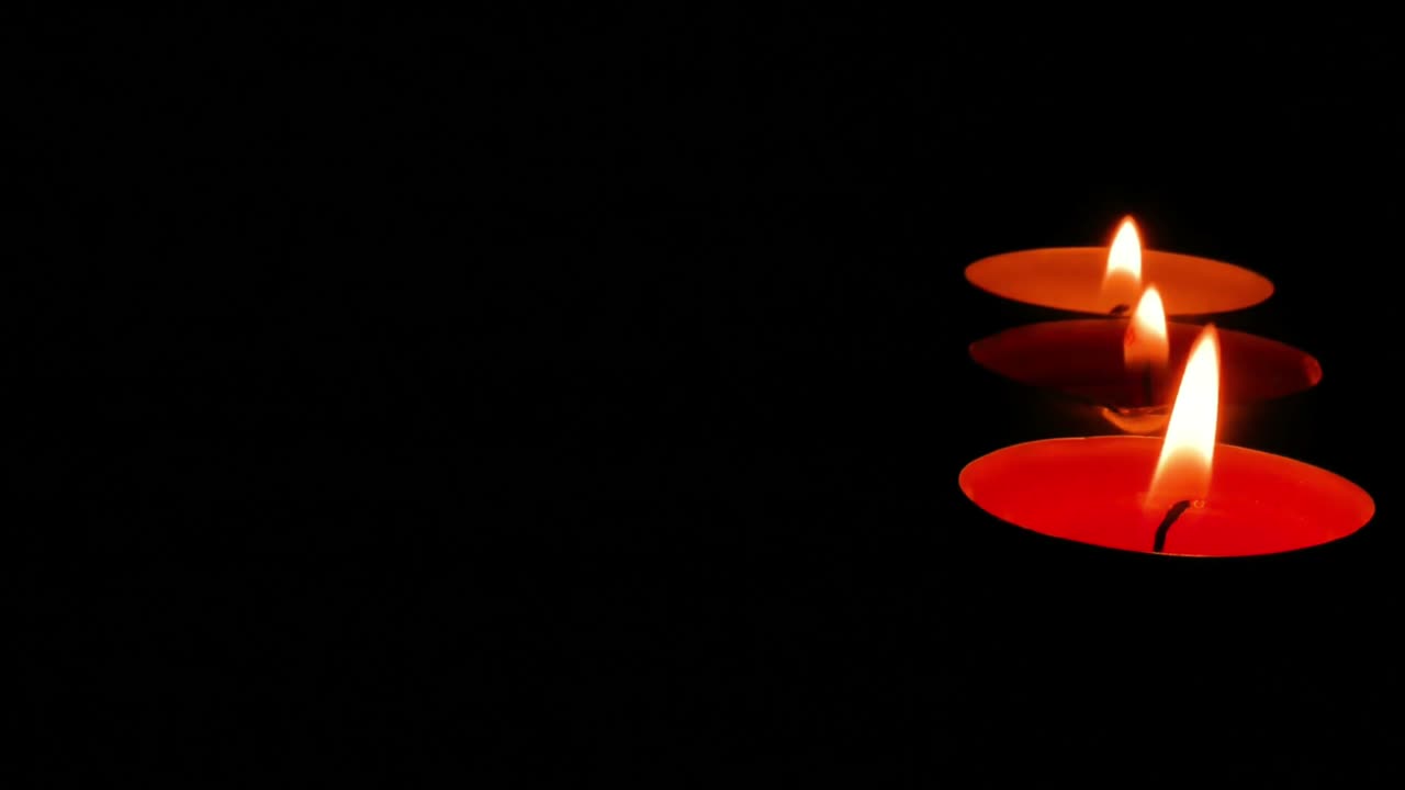 Candles burning in the dark, from the grounding meditation