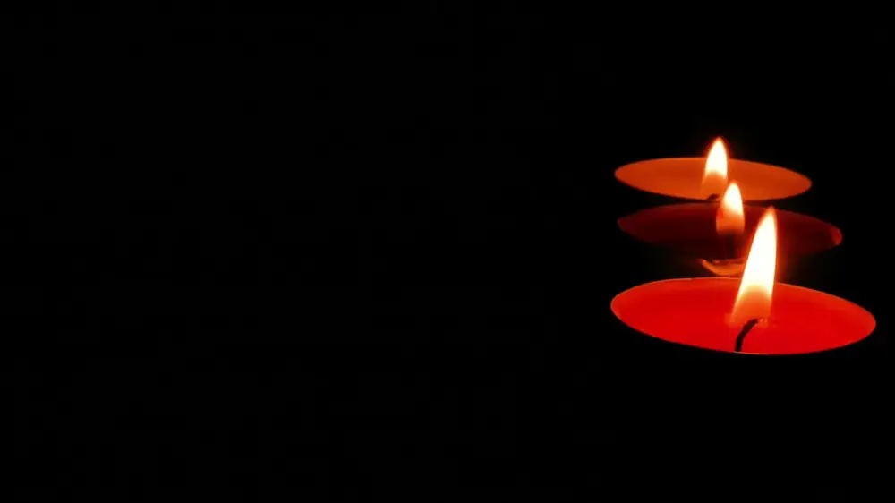 Candles burning in the dark, from the grounding meditation